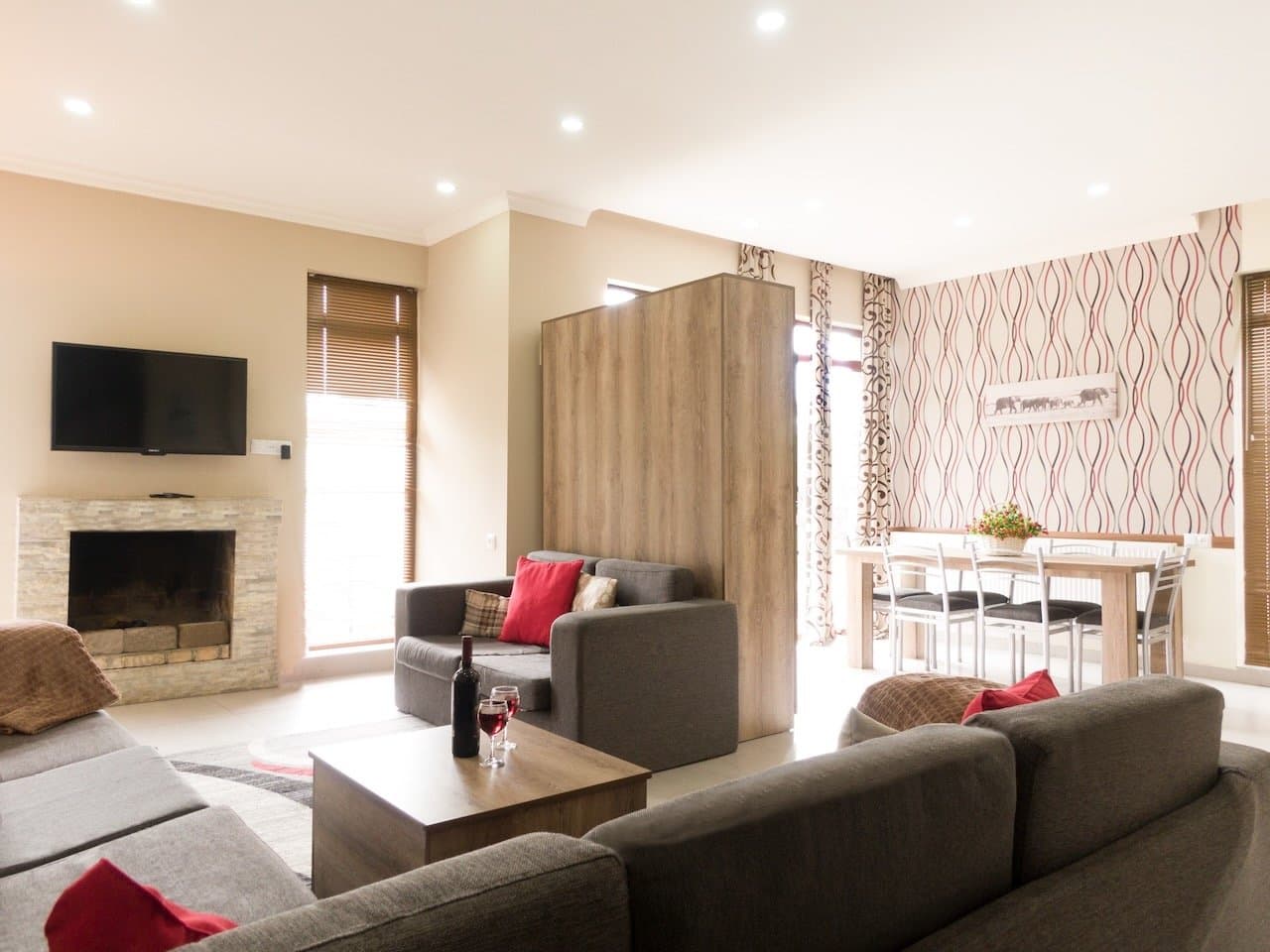 Spacious villa living room with seating and dining area.