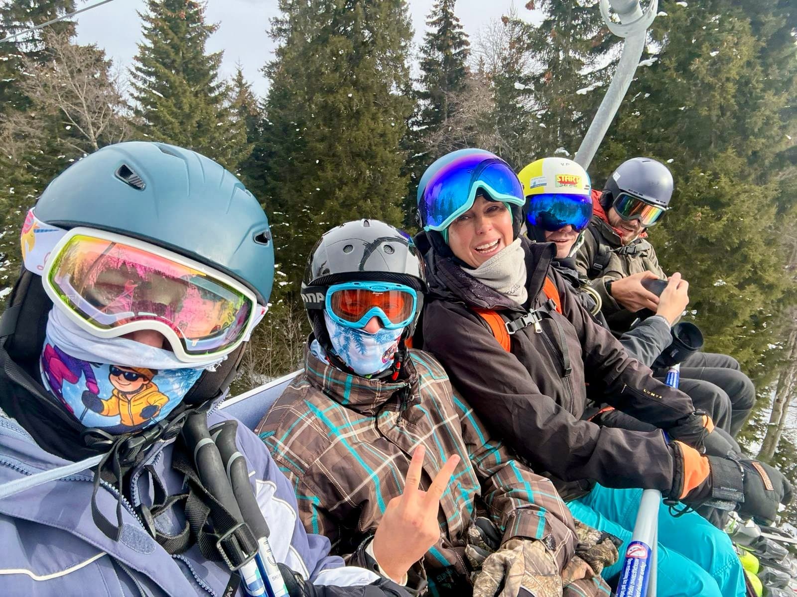 Group of skiers enjoying a day on the slopes.